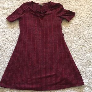 A red crossed up dress